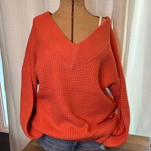 Off the shoulder, low V neck sweater